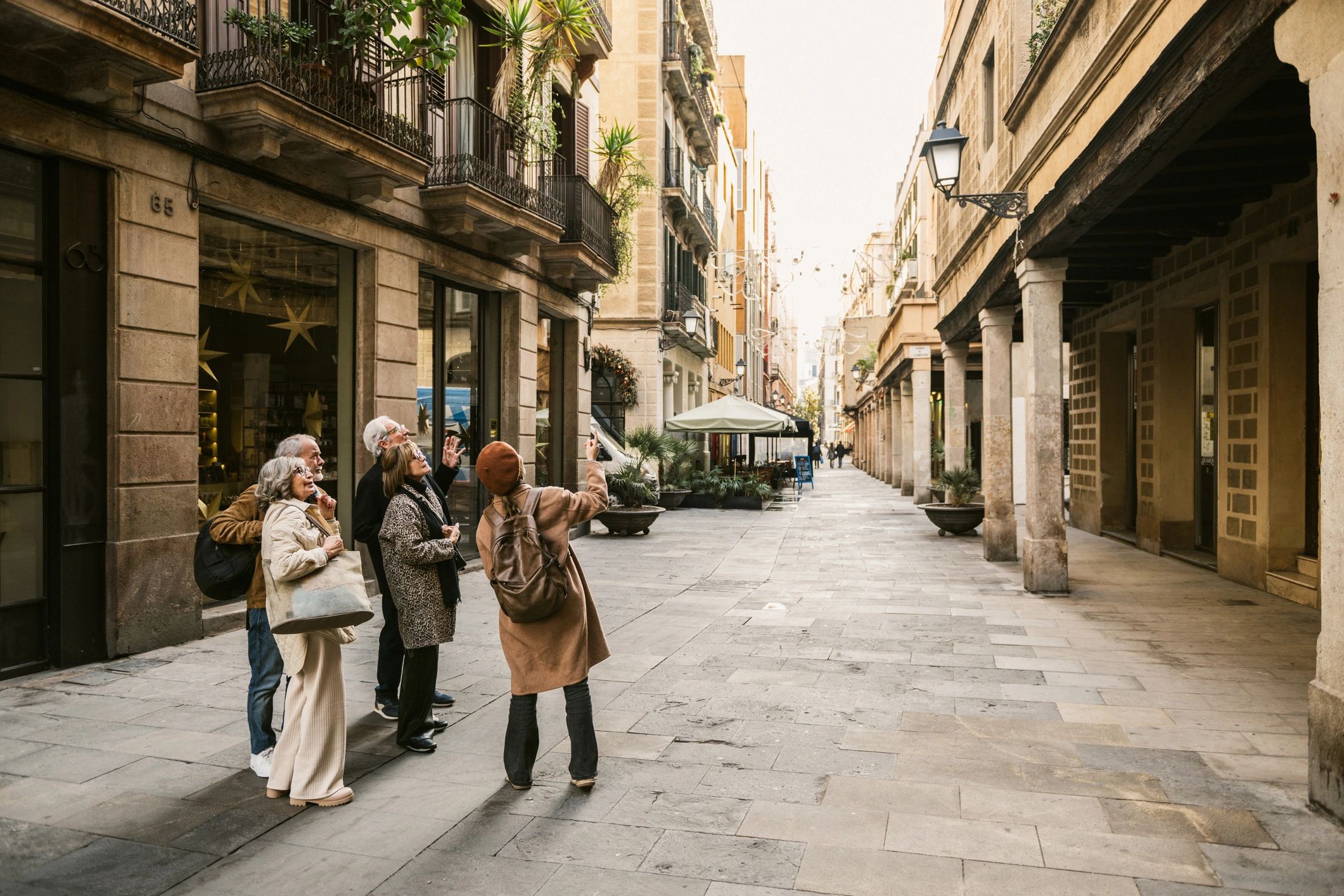 Barcelona tour guide leading visitors on a city experience